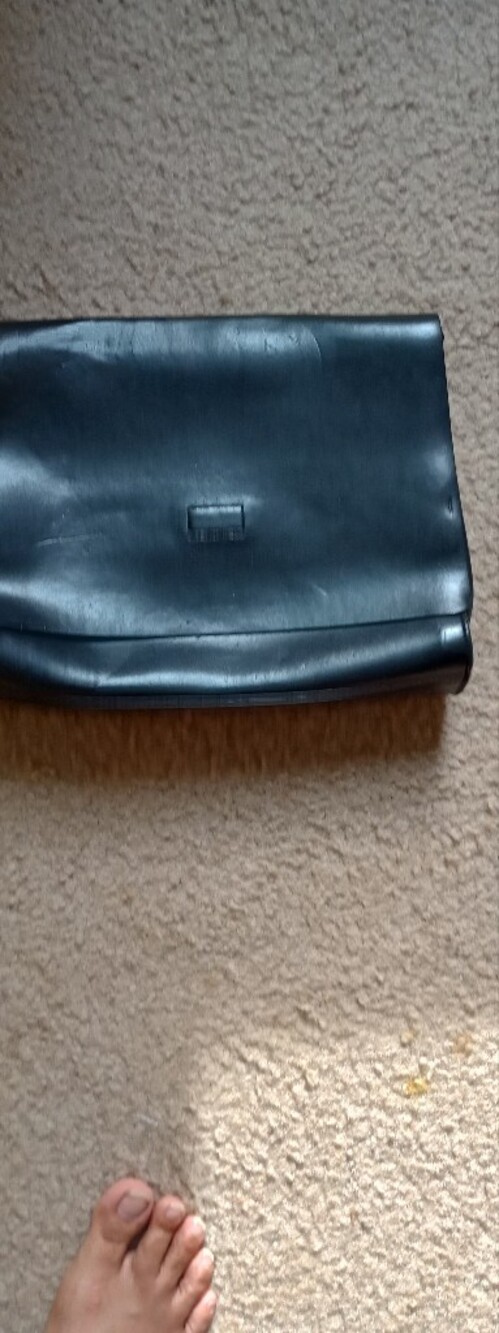 Jane Shilton black leather clutch wallet.